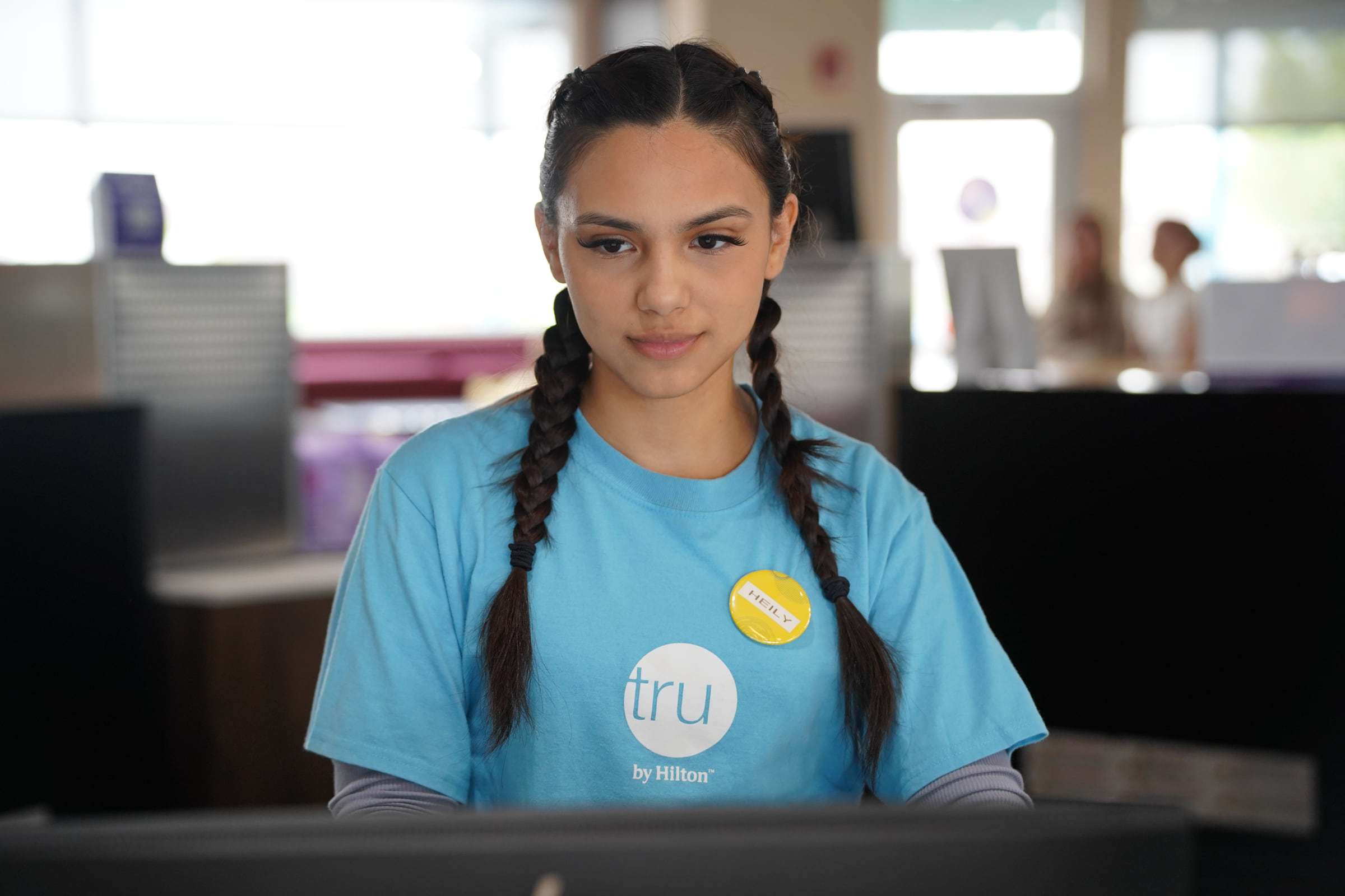 Front desk team member at Tru by Hilton