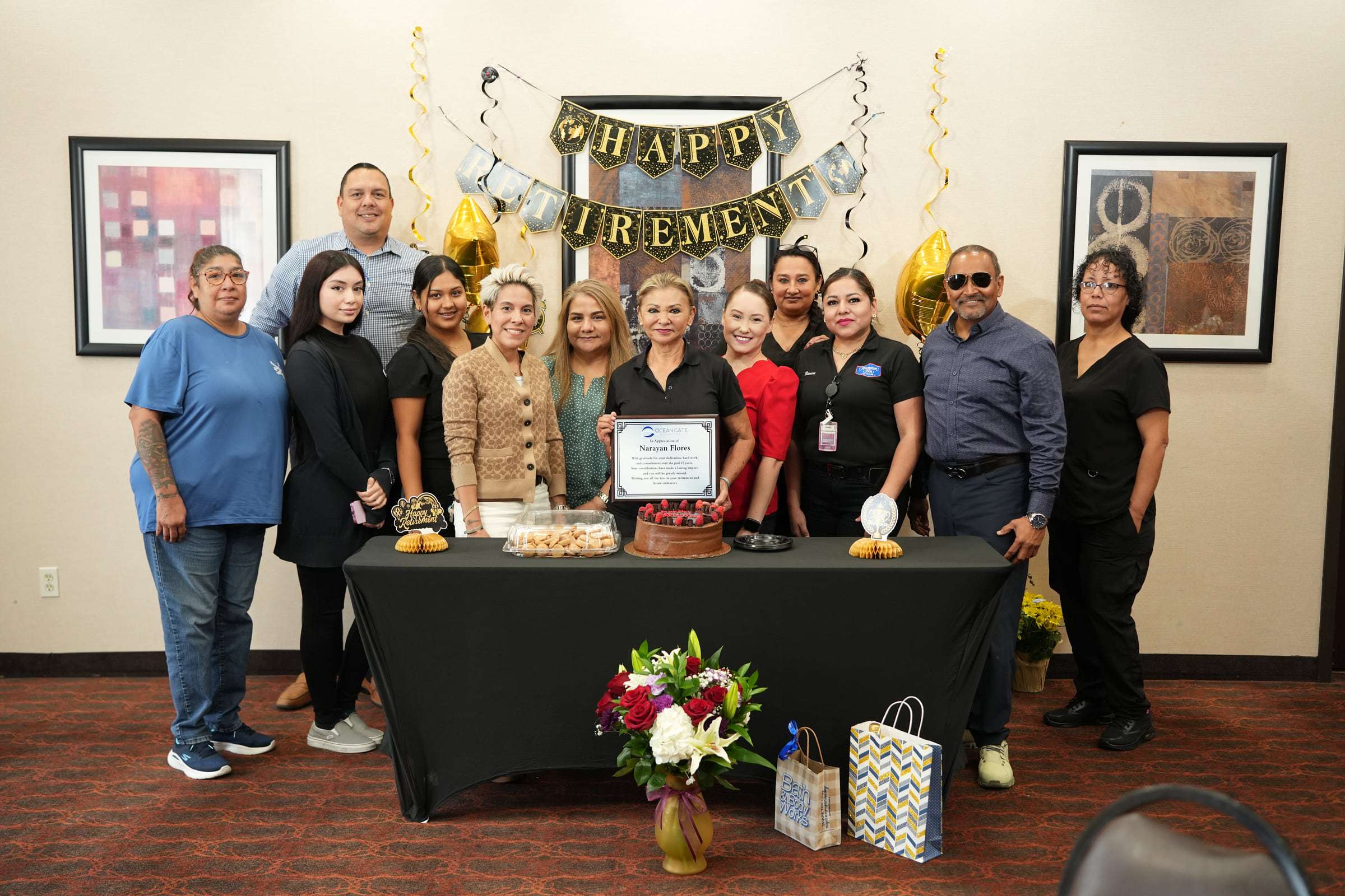 Ocean Gate Hospitality team celebrating a retirement