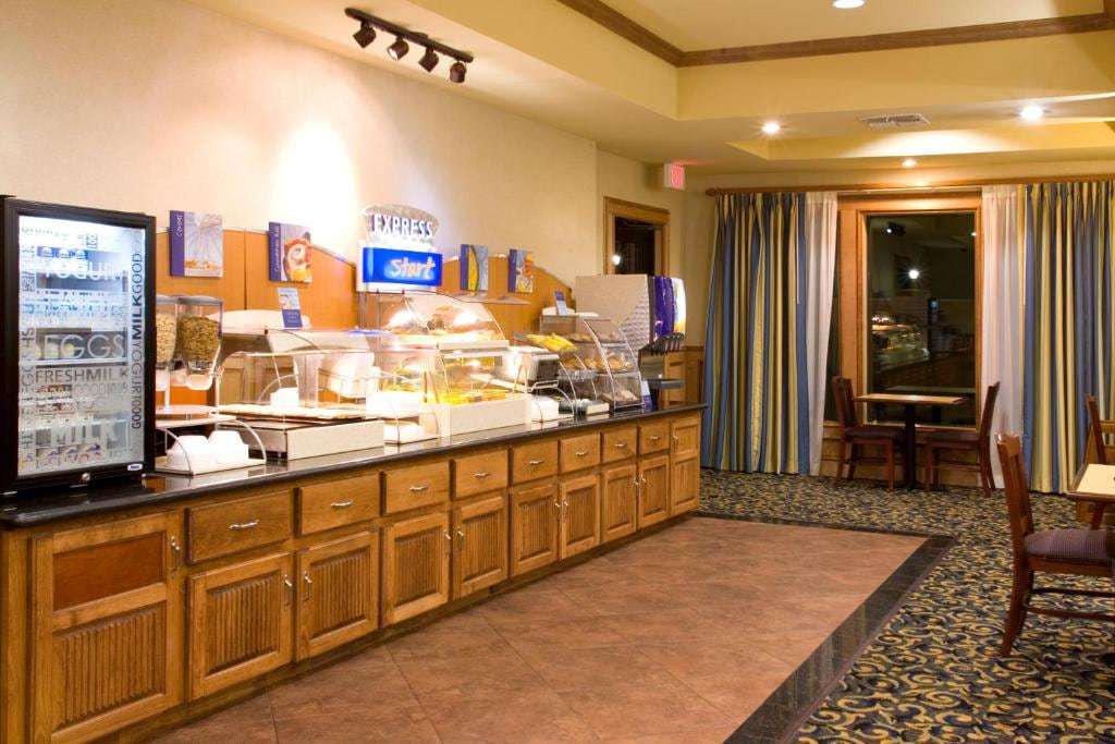 Express Start breakfast bar with cereal dispensers, pastries and drinks fridge beside dining tables