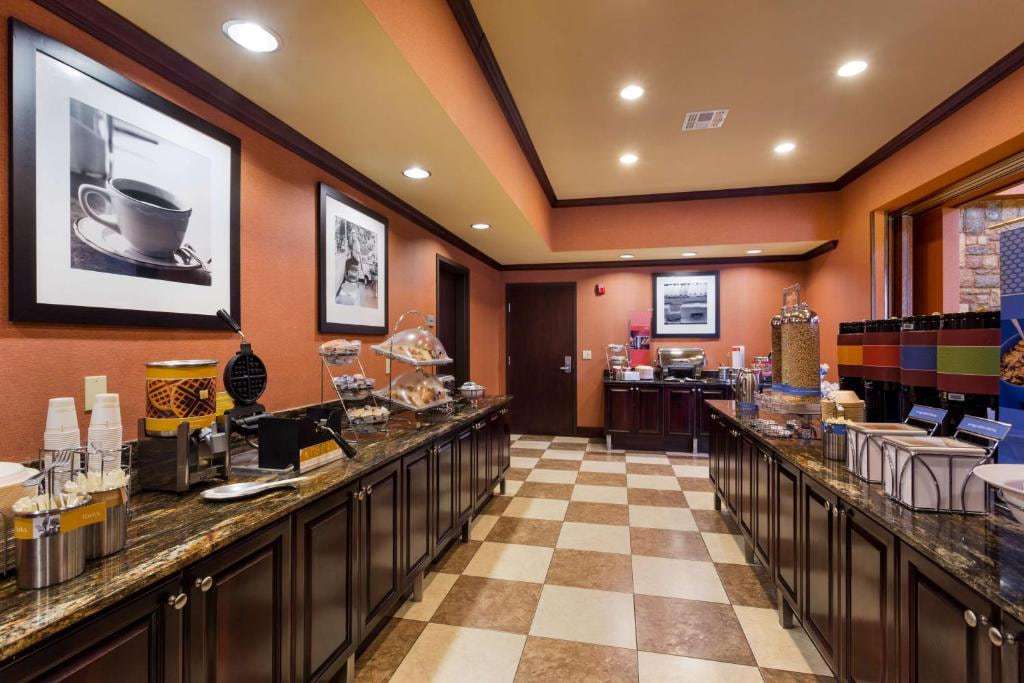 Breakfast area with waffle maker, cereal dispensers and granite buffet counters