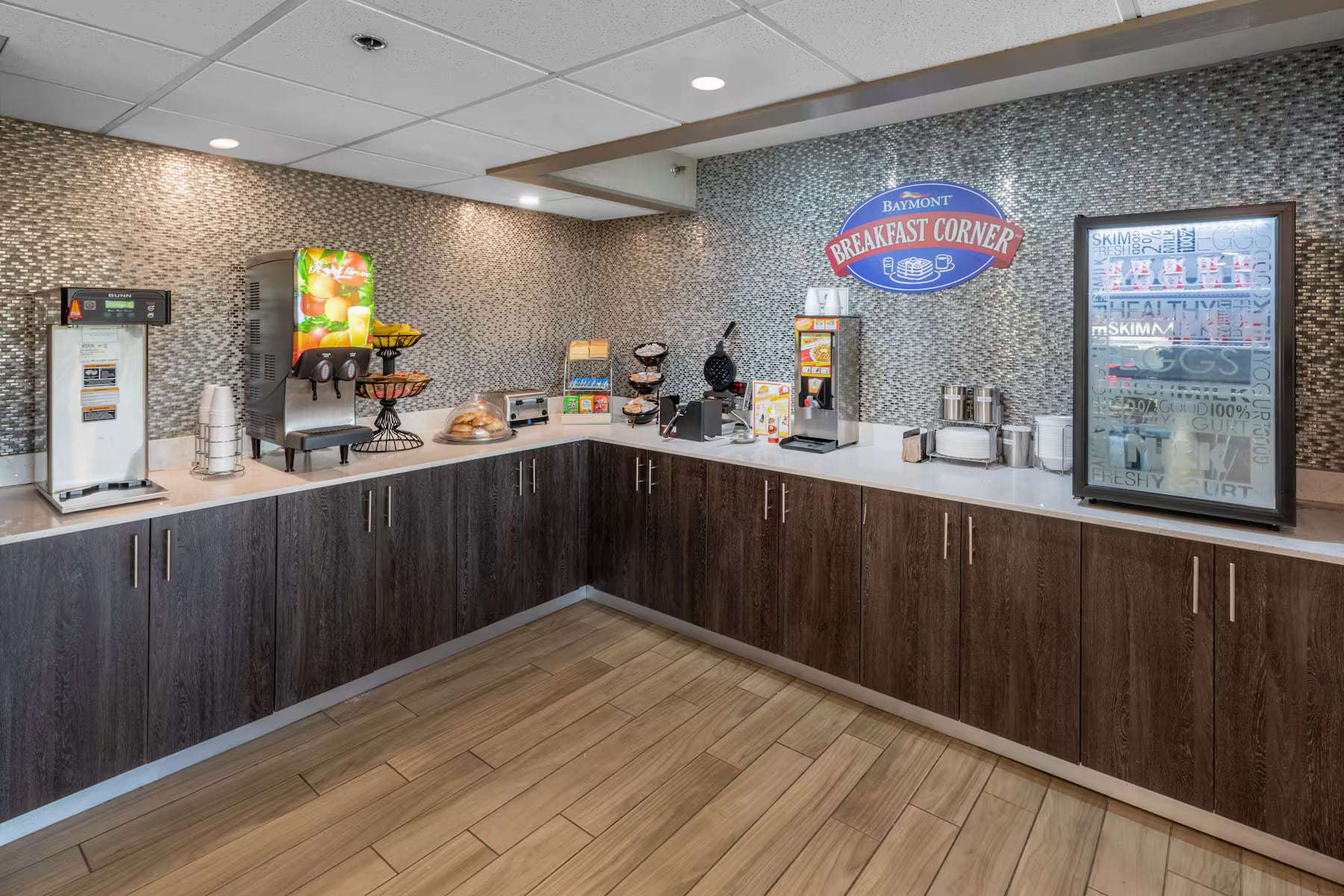 Breakfast Corner buffet with juice, coffee, waffle maker and drinks fridge
